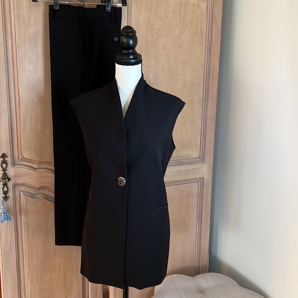 Stylish black vest with matching straight leg pant by Franco Mirabelli
